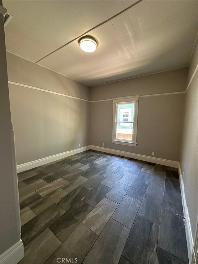 508 S Orange Ave, Santa Ana, CA 92701 - unfurnished room featuring baseboards and wood tiled floors