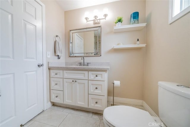 18210 Deauville Dr, Victorville, CA 92395 - half bathroom featuring vanity and tile patterned flooring