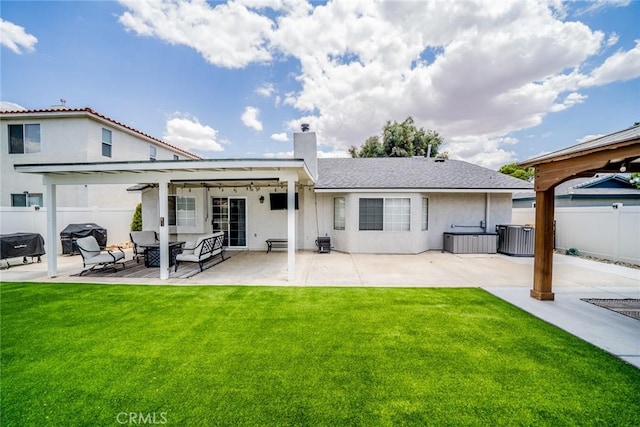 18210 Deauville Dr, Victorville, CA 92395 - back of property with an outdoor hangout area, stucco siding, a patio, and a chimney