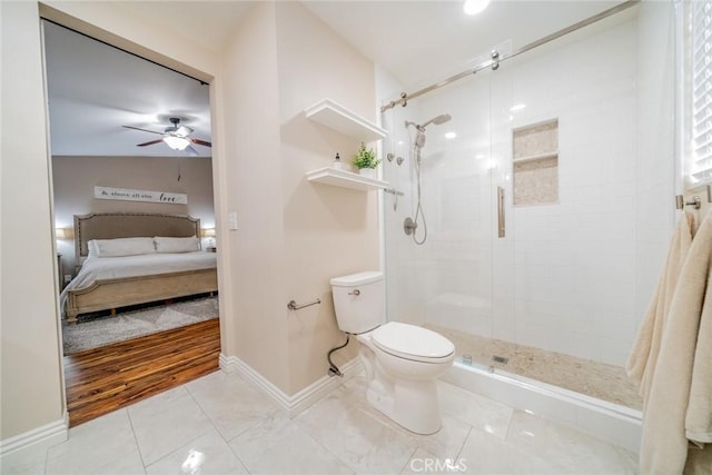 18210 Deauville Dr, Victorville, CA 92395 - ensuite bathroom featuring a shower stall, ceiling fan, and tile patterned flooring