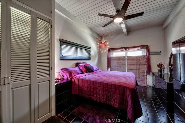 2120 N Rose St, Burbank, CA 91505 - bedroom featuring dark tile patterned flooring, a closet, a ceiling fan, and wooden ceiling