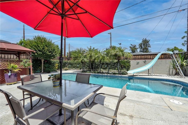 2120 N Rose St, Burbank, CA 91505 - view of pool with a water slide, a gazebo, a fenced backyard, and a patio area