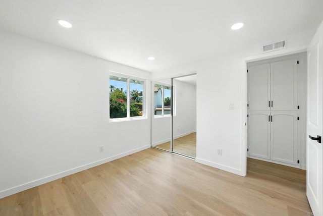 305 Spruce St, Chula Vista, CA 91911 - unfurnished bedroom with light wood-style flooring, recessed lighting, and a closet