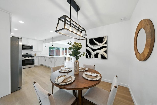 305 Spruce St, Chula Vista, CA 91911 - dining room featuring light wood-style floors and recessed lighting