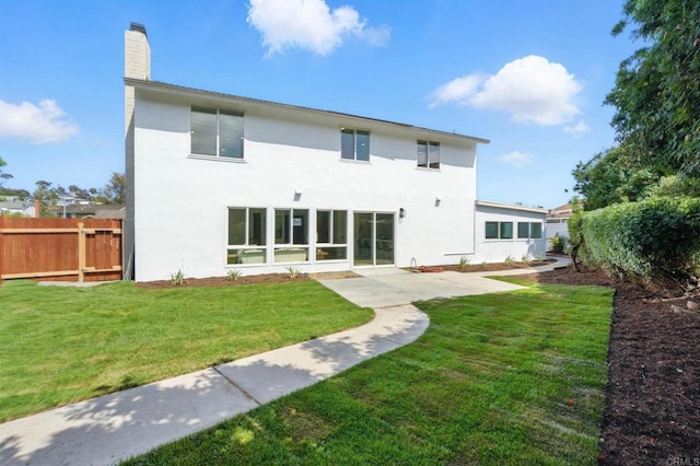 305 Spruce St, Chula Vista, CA 91911 - rear view of property with stucco siding, a chimney, and a patio