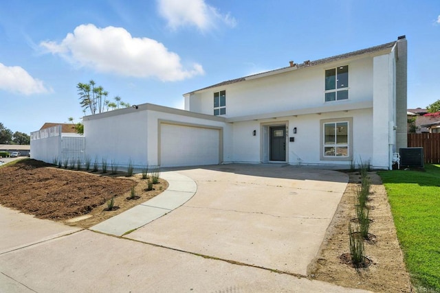305 Spruce St, Chula Vista, CA 91911 - view of front facade with stucco siding, driveway, and an attached garage