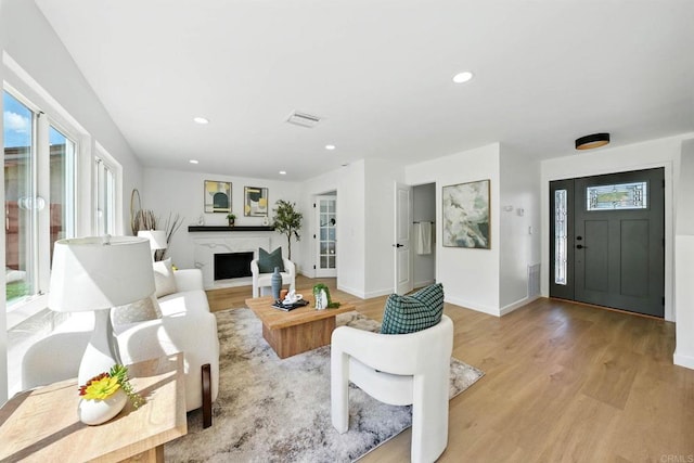305 Spruce St, Chula Vista, CA 91911 - living area featuring light wood finished floors, recessed lighting, and a fireplace