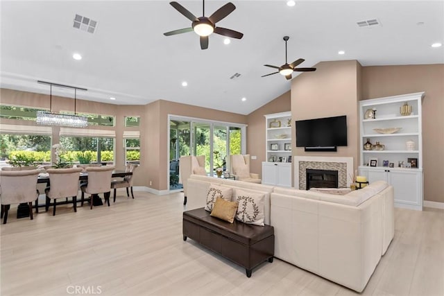 16261 Pineview Rd, Canyon Country, CA 91387 - living room with a ceiling fan, high vaulted ceiling, a fireplace, light wood-style floors, and recessed lighting