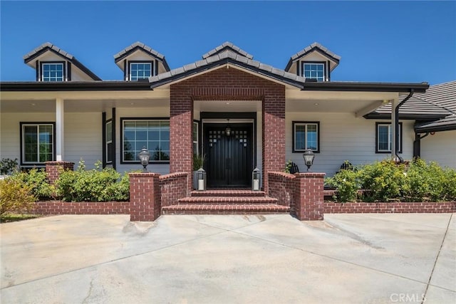 16261 Pineview Rd, Canyon Country, CA 91387 - entrance to property featuring brick siding and a tiled roof