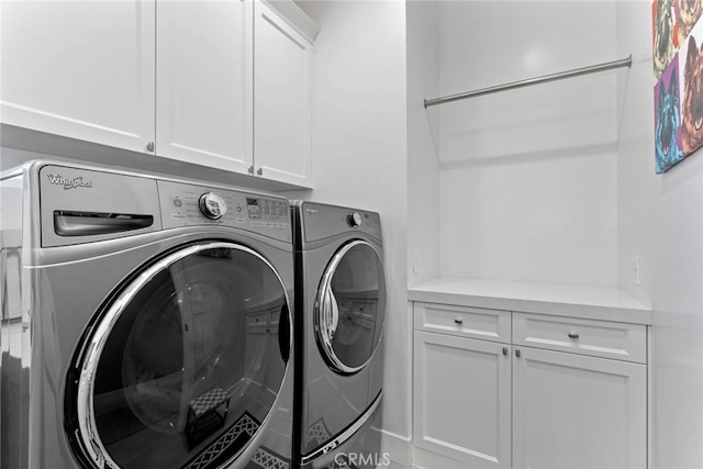 16261 Pineview Rd, Canyon Country, CA 91387 - laundry area featuring cabinet space and washing machine and clothes dryer