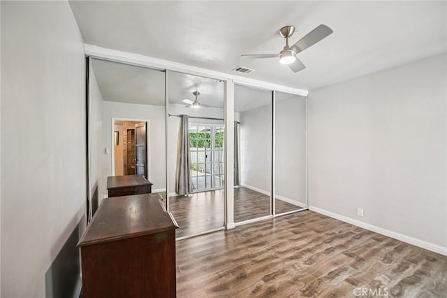 7803 Clive Ave, Whittier, CA 90606 - unfurnished bedroom featuring wood finished floors and a ceiling fan