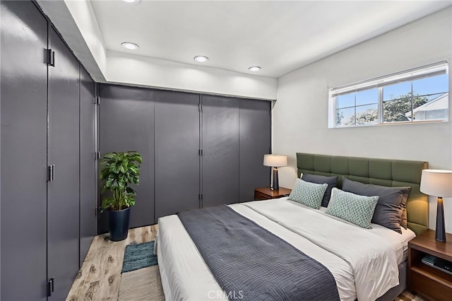 7803 Clive Ave, Whittier, CA 90606 - bedroom with light wood-style floors and recessed lighting