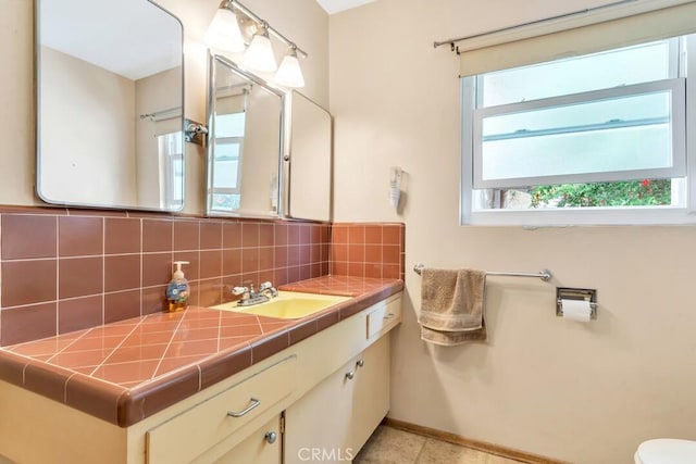 4760 73rd St, La Mesa, CA 91942 - bathroom featuring decorative backsplash and vanity