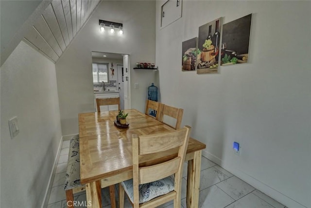 4519 Bresee Ave, Baldwin Park, CA 91706 - dining space featuring baseboards and light marble finish floors