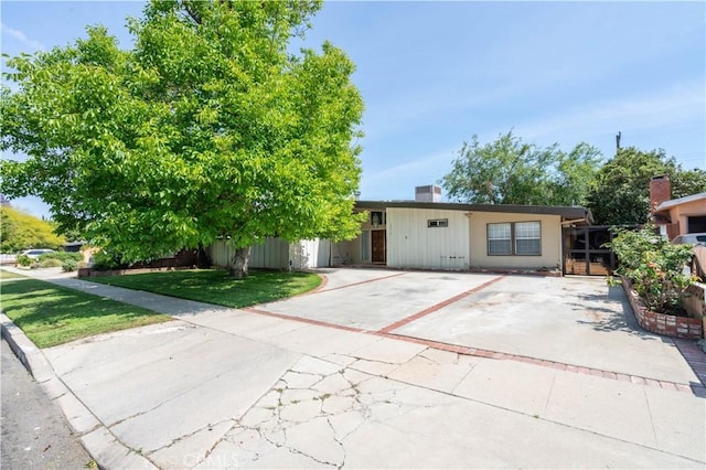 19516 Blythe St, Reseda, CA 91335 - view of front of home featuring driveway and a front yard