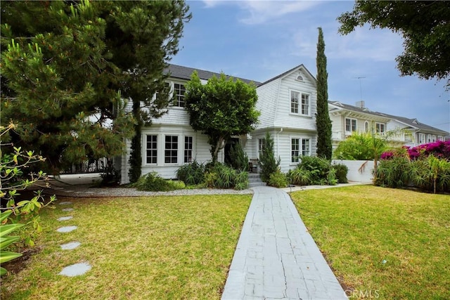 738 S Norton Ave, Los Angeles, CA 90005 - view of front facade with a front yard