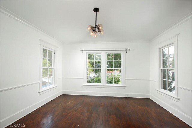 738 S Norton Ave, Los Angeles, CA 90005 - unfurnished room featuring a chandelier, dark wood finished floors, and ornamental molding