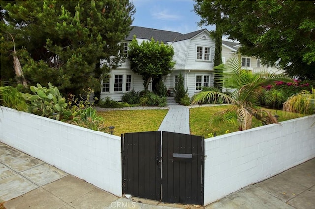 738 S Norton Ave, Los Angeles, CA 90005 - view of front of home featuring a fenced front yard and a gate