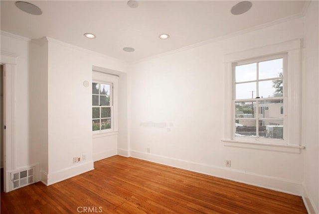 738 S Norton Ave, Los Angeles, CA 90005 - spare room with ornamental molding, wood finished floors, plenty of natural light, and recessed lighting