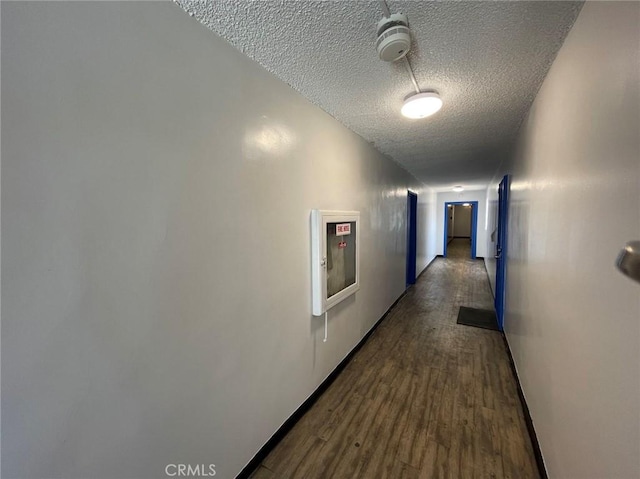 8070 Langdon Ave, Van Nuys, CA 91406 - hallway with a textured ceiling and dark wood-style floors