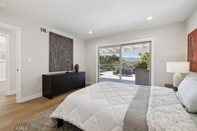 311 Prospect St, Oak View, CA 93022 - bedroom with access to outside, wood finished floors, and recessed lighting