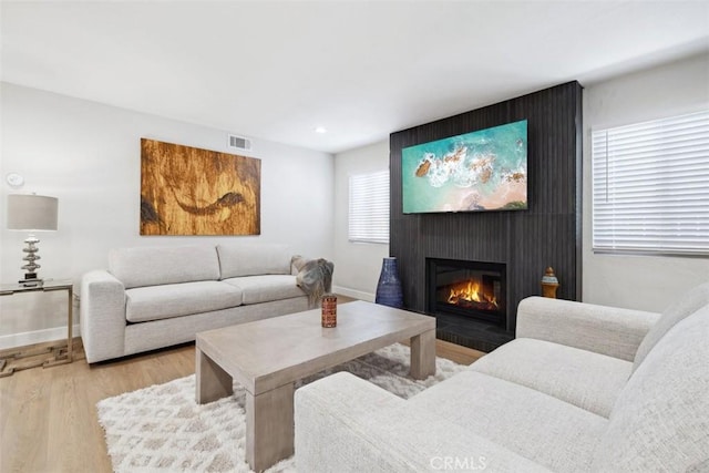311 Prospect St, Oak View, CA 93022 - living room featuring a fireplace, light wood finished floors, and recessed lighting