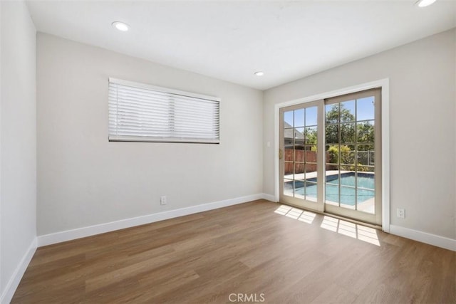 311 Prospect St, Oak View, CA 93022 - empty room with wood finished floors and recessed lighting