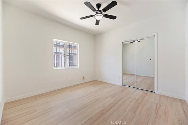 2018 W Martin Luther King Jr Blvd, Los Angeles, CA 90062 - unfurnished bedroom featuring wood finished floors, a closet, and ceiling fan