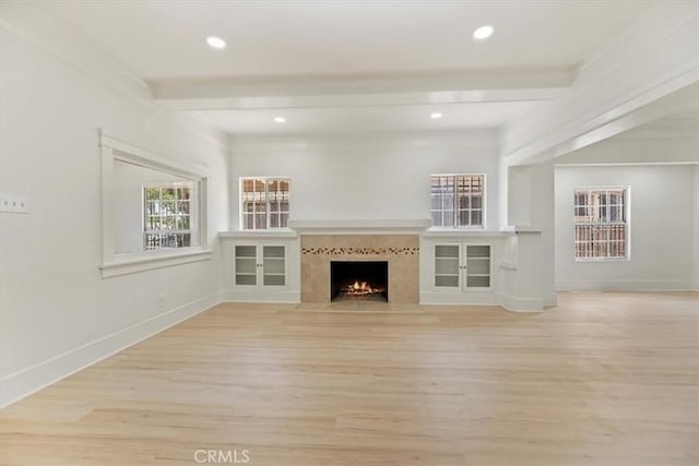 2018 W Martin Luther King Jr Blvd, Los Angeles, CA 90062 - unfurnished living room featuring light wood-style flooring, a fireplace with flush hearth, and recessed lighting