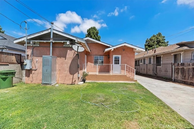 2018 W Martin Luther King Jr Blvd, Los Angeles, CA 90062 - rear view of house with stucco siding