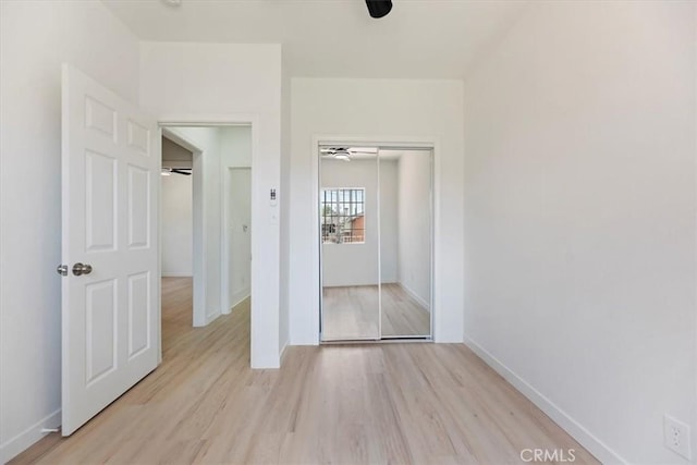 2018 W Martin Luther King Jr Blvd, Los Angeles, CA 90062 - unfurnished bedroom with light wood finished floors and a closet