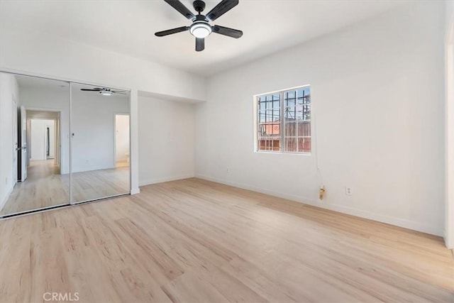 2018 W Martin Luther King Jr Blvd, Los Angeles, CA 90062 - unfurnished bedroom featuring wood finished floors and a ceiling fan