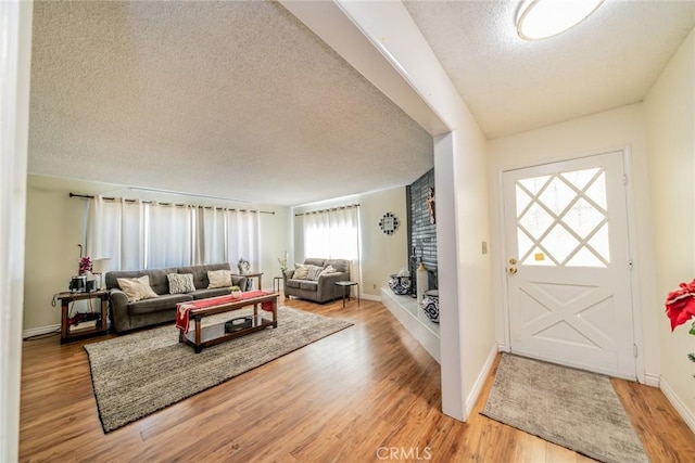12995 Leith Way, Yucaipa, CA 92399 - foyer with a textured ceiling and light wood-type flooring