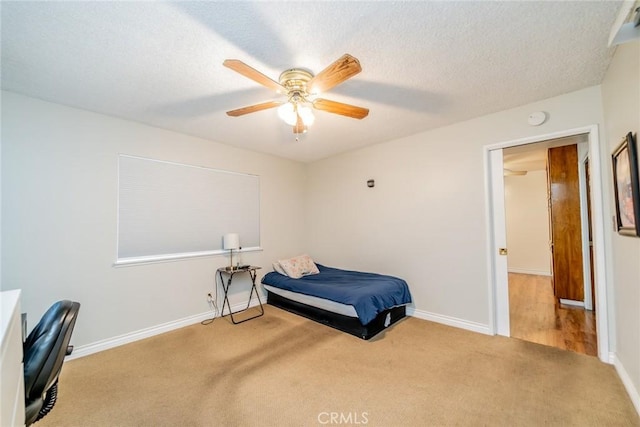 12995 Leith Way, Yucaipa, CA 92399 - bedroom with carpet flooring, a textured ceiling, and a ceiling fan
