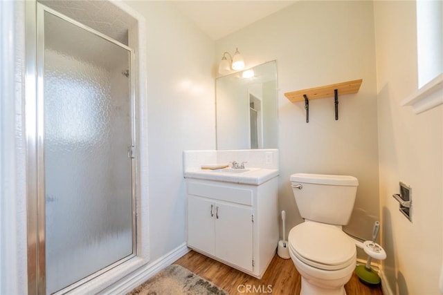 12995 Leith Way, Yucaipa, CA 92399 - full bath featuring wood finished floors, a shower stall, and vanity