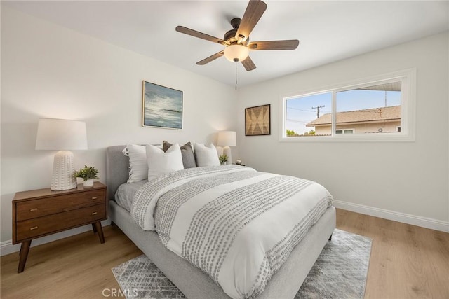 19331 Cindy Ln, Huntington Beach, CA 92646 - bedroom with light wood-style floors and a ceiling fan