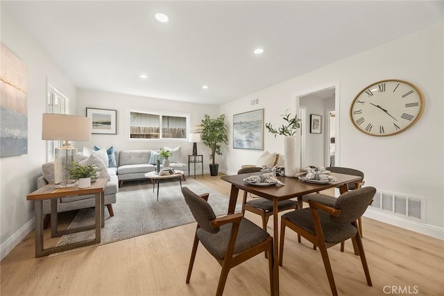 19331 Cindy Ln, Huntington Beach, CA 92646 - dining room with light wood finished floors and recessed lighting