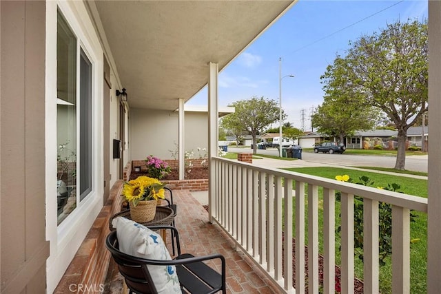 19331 Cindy Ln, Huntington Beach, CA 92646 - covered porch featuring a residential view