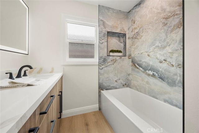 19331 Cindy Ln, Huntington Beach, CA 92646 - full bath with wood finished floors, vanity, and a garden tub
