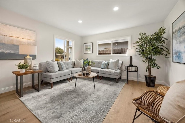 19331 Cindy Ln, Huntington Beach, CA 92646 - living room with wood finished floors and recessed lighting