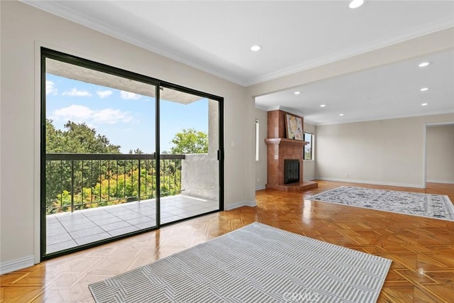635 E Elmwood Ave Unit 307, Burbank, CA 91501 - unfurnished living room featuring healthy amount of natural light, recessed lighting, ornamental molding, and a fireplace