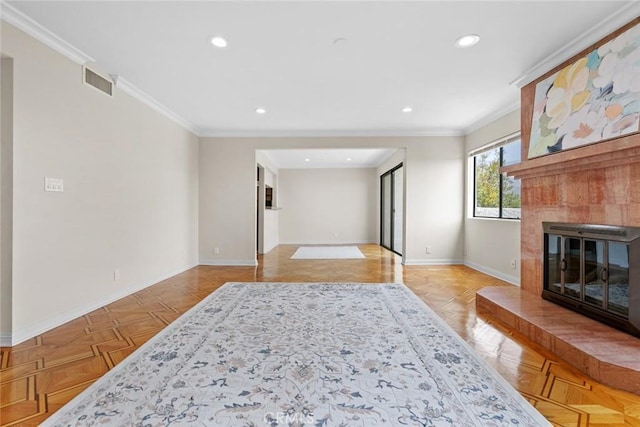 635 E Elmwood Ave Unit 307, Burbank, CA 91501 - unfurnished living room with ornamental molding, a tiled fireplace, and recessed lighting