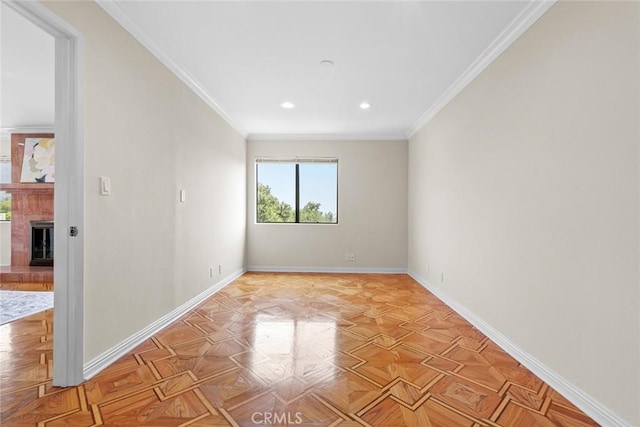635 E Elmwood Ave Unit 307, Burbank, CA 91501 - empty room with crown molding, a fireplace with raised hearth, and recessed lighting