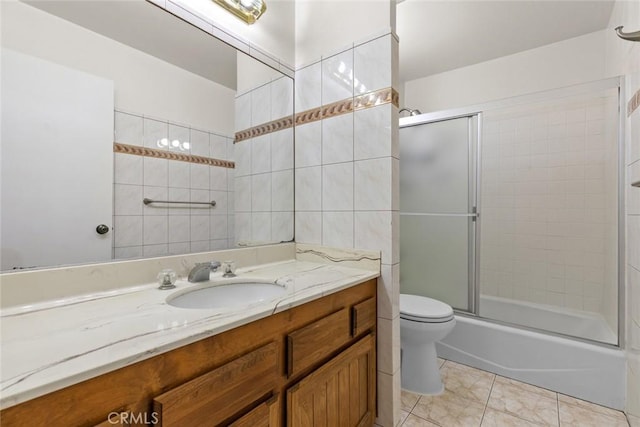 635 E Elmwood Ave Unit 307, Burbank, CA 91501 - full bath featuring vanity, shower / bath combination with glass door, and tile walls