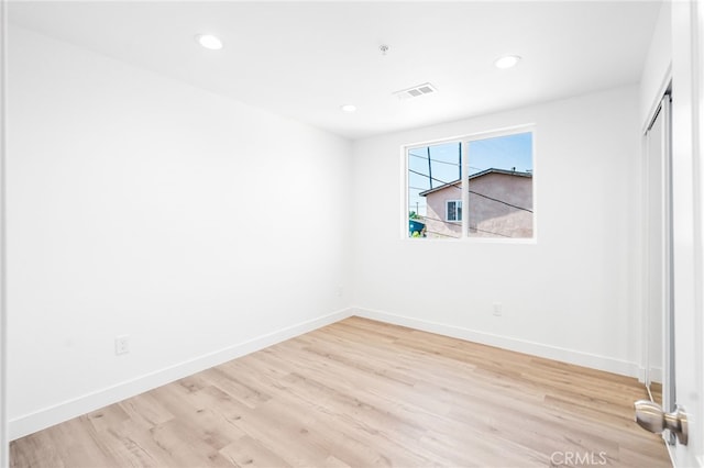 10415 Avalon Blvd, Los Angeles, CA 90003 - unfurnished bedroom featuring light wood-type flooring, recessed lighting, and a closet