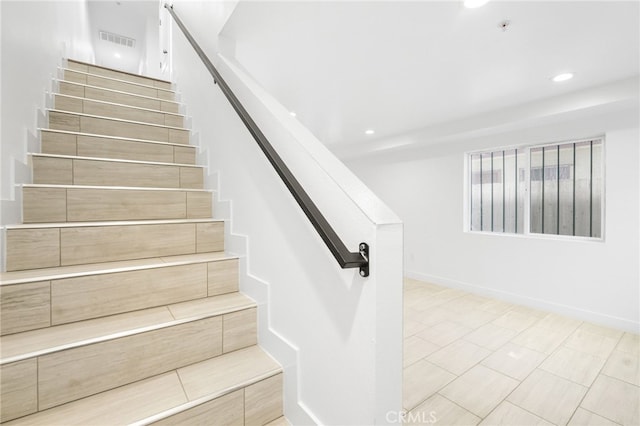10415 Avalon Blvd, Los Angeles, CA 90003 - staircase featuring recessed lighting and baseboards