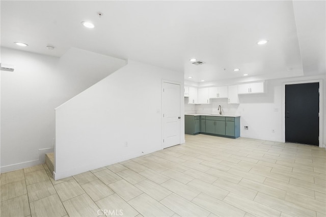10415 Avalon Blvd, Los Angeles, CA 90003 - unfurnished living room with a sink and recessed lighting