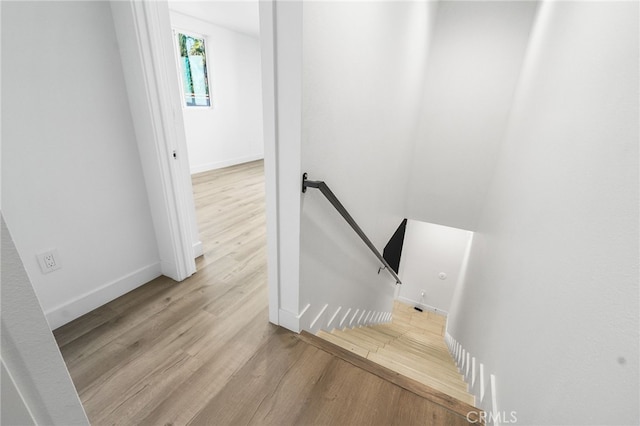 10415 Avalon Blvd, Los Angeles, CA 90003 - stairway featuring wood finished floors and baseboards
