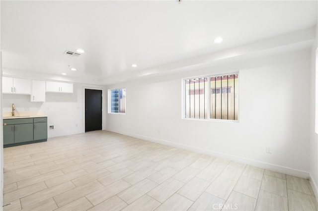 10415 Avalon Blvd, Los Angeles, CA 90003 - unfurnished living room with recessed lighting and baseboards