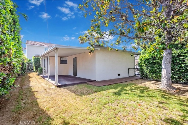 4134 Rio Hondo Ave, Rosemead, CA 91770 - back of property featuring stucco siding, a patio area, and an attached carport
